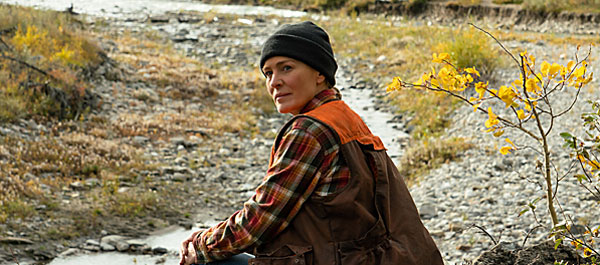 Land | reviewed by Miles David Moore | Scene4 Magazine | October 2021 | www.scene4.com